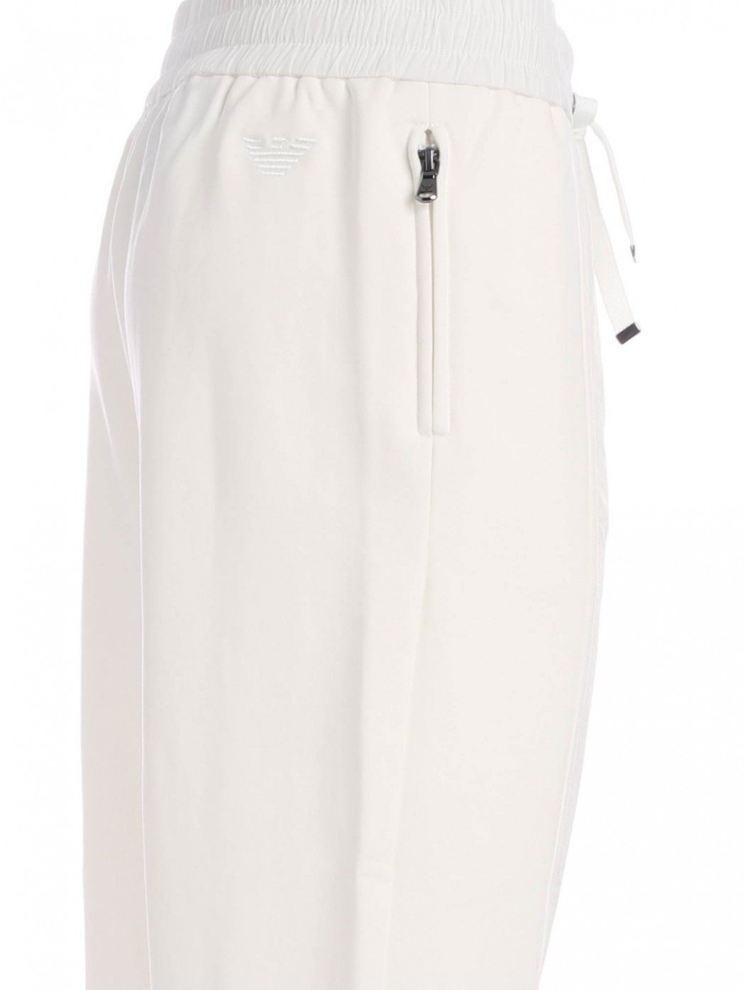 Cotton blend trousers Color: white Side pockets with zip Elasticated waist and bottom Tone-on-tone logo embroidery on the back D