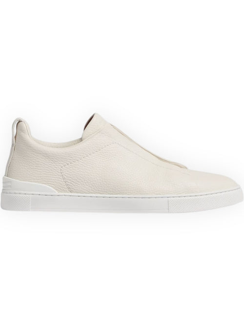 Triple stitch low-top sneakers in off white